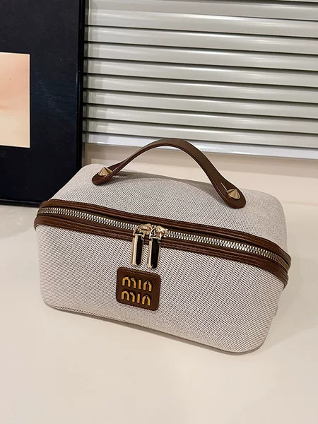 New cross-border cosmetic bag for women, portable, high-end, with compartments, large capacity, and a luxurious feel; waterproof and suitable for storing toiletries