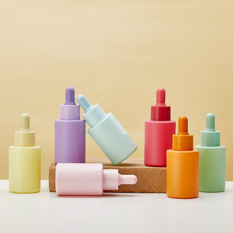 新しい 30 ミリリットルマカロンエッセンシャルオイルボトルハイエンドエッセンススポイトボトル色ガラス化粧品ボトル卸売|undefined