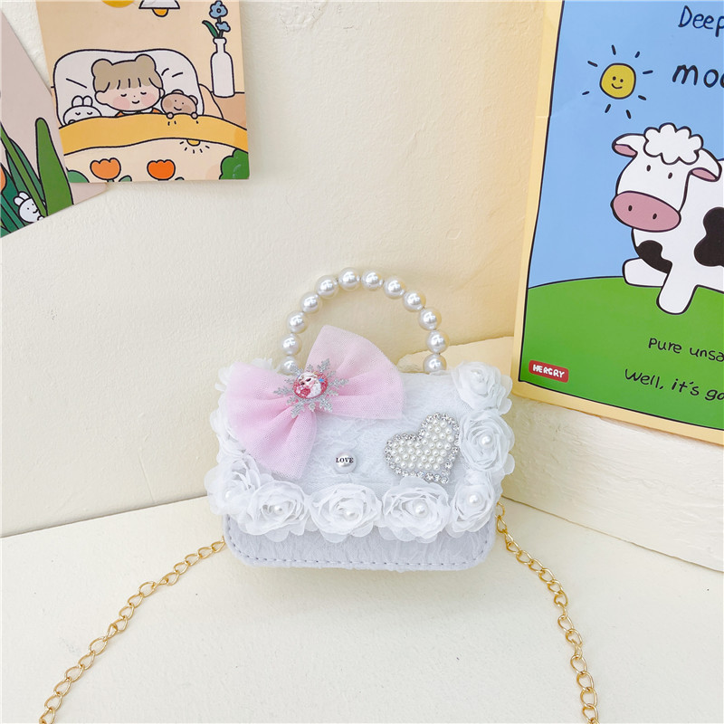 Nuevo en línea rojo perla portátil bolso de los niños lindo suave lindo dibujos animados moda mensajero bolsa niña estilo occidental bolso de hombro