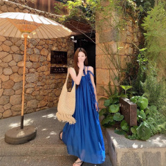 克莱因蓝色海边度假风吊带连衣裙女2025夏季新款法式绝美显瘦长裙