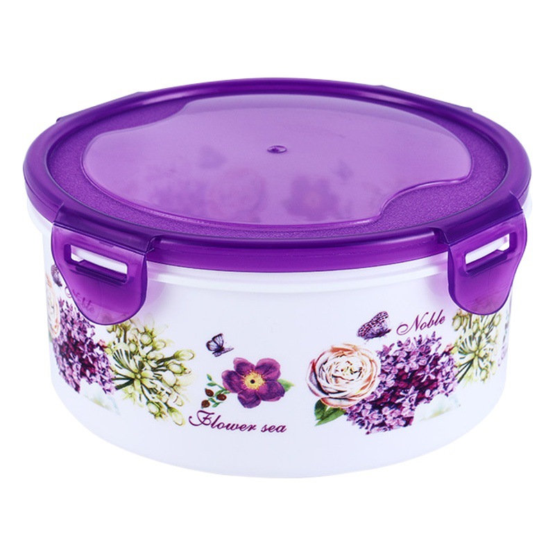 Caja redonda hermética para almacenamiento de alimentos, ideal para refrigerador, camping o uso doméstico.