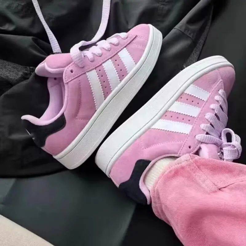 Zapatos de pan de la escuela secundaria lazos zapatos deportivos de altura baja zapatos antideslizantes zapatos de skate para mujeres rayas de color caramelo fondo grueso resistente al desgaste