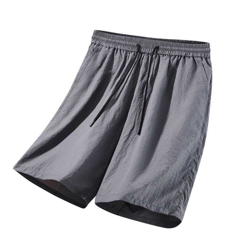 Camisas y menos ropa pantalones cortos casuales de verano seda de hielo para hombres, transpirable y de secado rápido, pantalones de cinco puntos sueltos para correr en deportes callejeros fritos