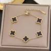 Golden bracelet, four-leaf clover