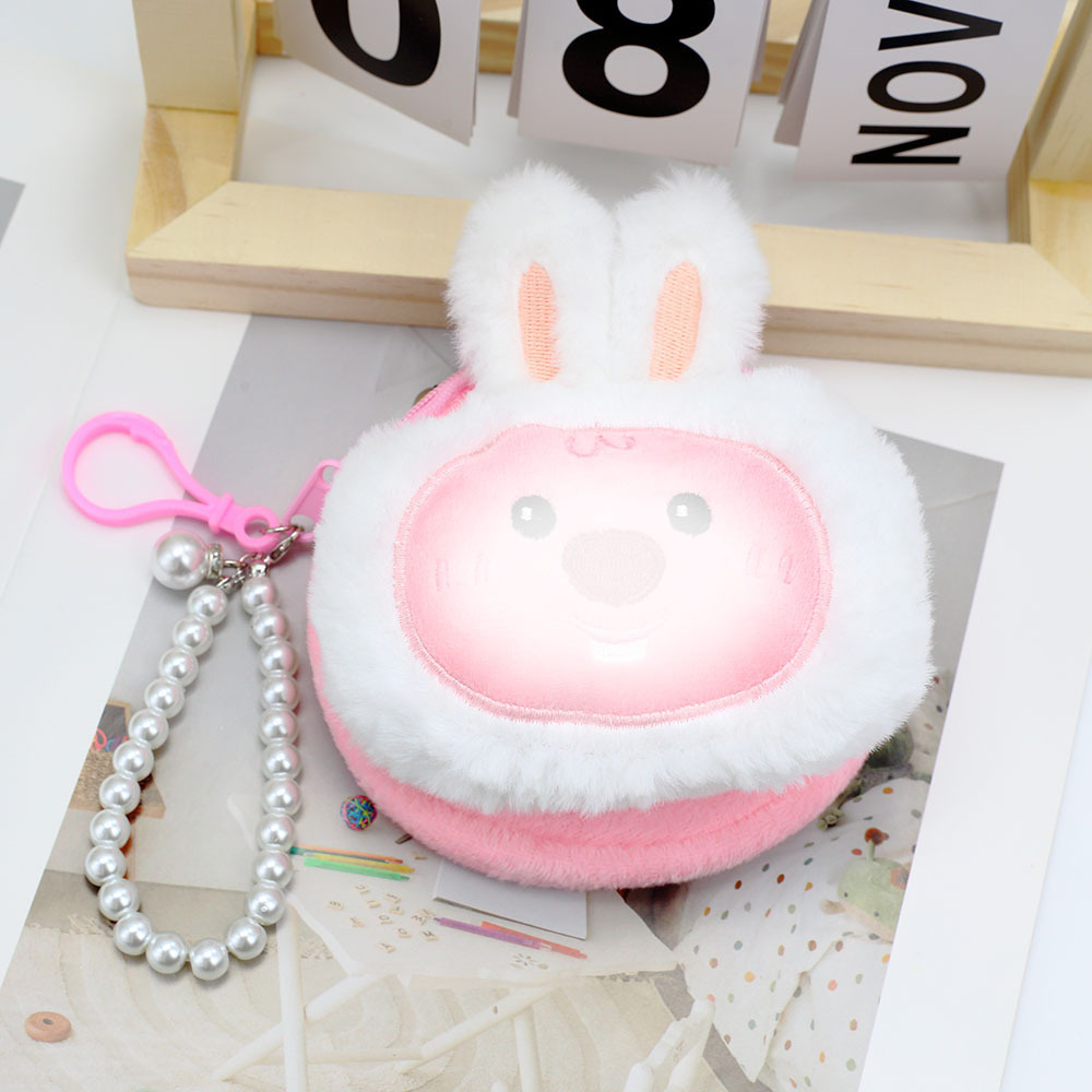 핑크 토끼 귀 너구리