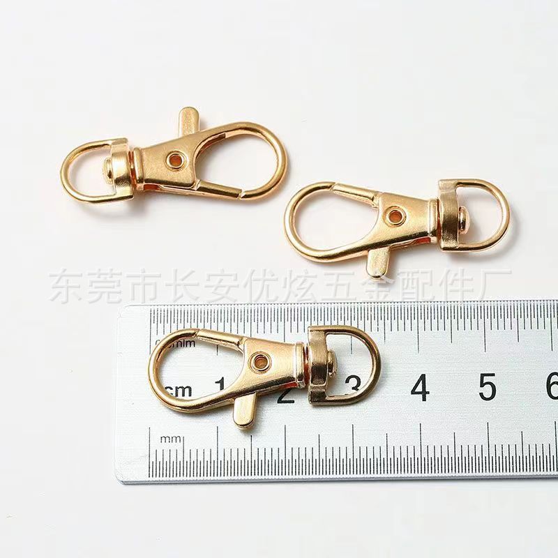 狗扣批发BM14板扣白镍色箱包五金配件小挂钩弹簧扣三分尾鱼嘴扣