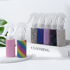 ダイヤモンドがちりばめられた新しいフルダイヤモンドスプレーボトルガーデニング花の水やりプラスチックボトルPETファインミストヘアボトルプレスボトル旅行ポータブル