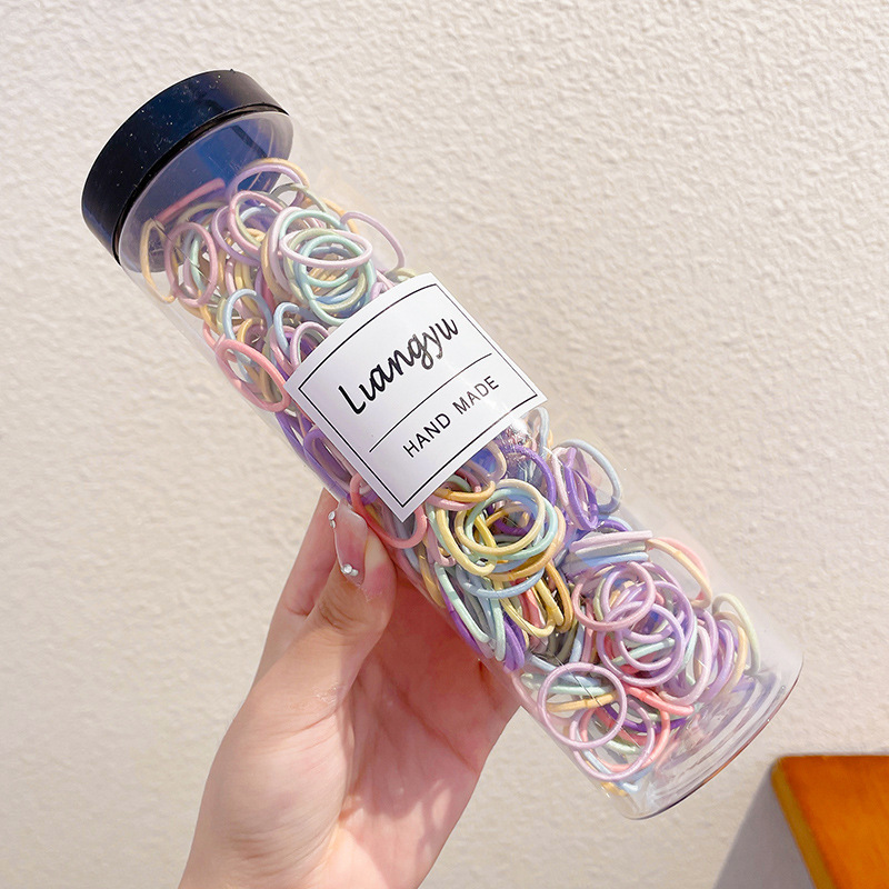 Bebés color caramelo de alta elasticidad pulgar anillo de cabello de niñas adornamiento de cabello de dopamina no daña banda de goma de cabello