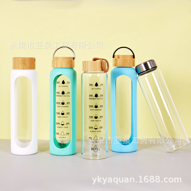 Cubierta de bambú transfronteriza de vidrio aislado de gran capacidad de una sola capa de vidrio de borosilicato taza de agua con taza de silicona cubierta protectora al por mayor