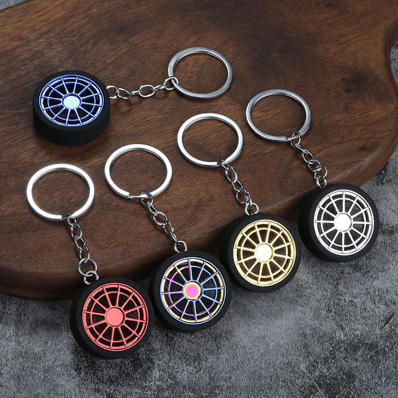 Factory wholesale cross-border supply of metal wheel tire keychain pendant creative car modified double wheel Factory wholesale cross-border supply of metal wheel tire keychain pendant creative car modified double wheel