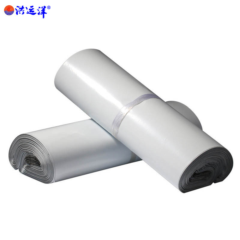 Bolsa de embalaje expreso blanco engrosada de tamaño grande y mediano tamaño pequeño nuevo material de logística bolsa impermeable bolsa de embalaje de ropa envío gratis