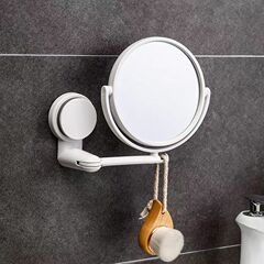 トイレの鏡は壁の小さい鏡を貼って、穴を開けないでください。