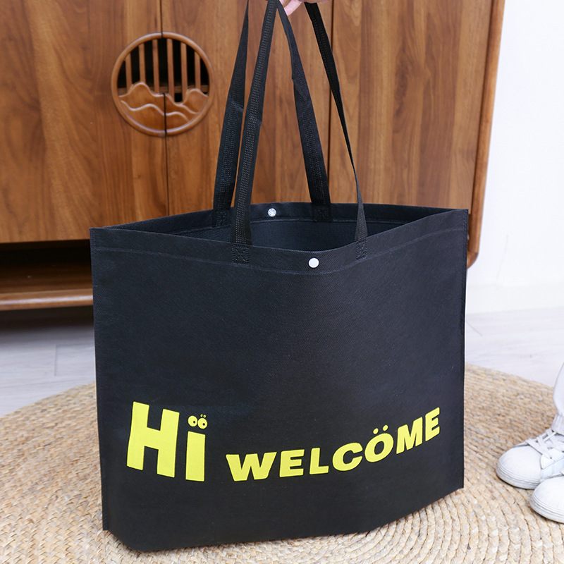 Bolso de mano no tejido de gran capacidad personalizado LOGO engrosado ropa de mujer protección ambiental bolsa de publicidad bolsa de compras de la tienda de ropa