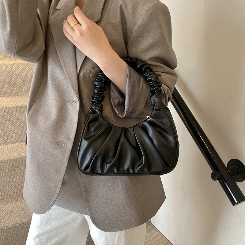 Versión coreana del bolso de axila de nicho 2025 primavera y verano nuevo bolso femenino casual bolso plisado neto del mismo estilo bolso de hombro marea