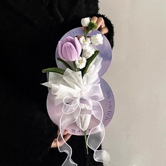 創意高級チューリップは花束を持っています。