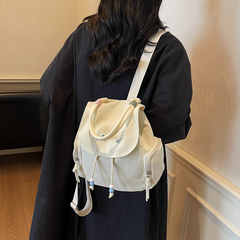 2025 moda moda moda personalidad mochila de textura casual simple nicho diseño de mochila de mujer de textura