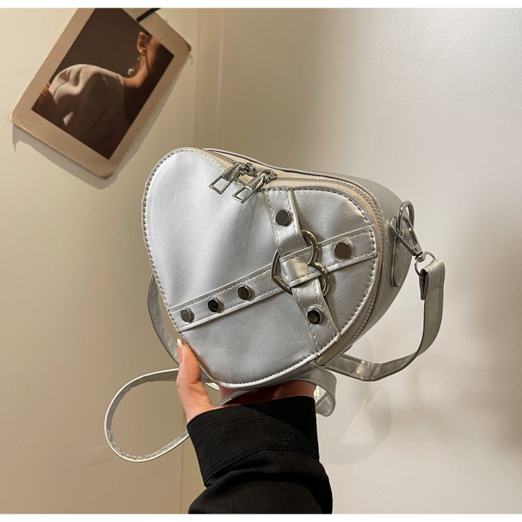 Internet celebridad personalizada de moda del todo-fósforo de color sólido en forma de corazón bolsa de costura bolsa de las mujeres nicho diseño crossbody hombro bolsa de las axilas