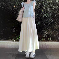 フランスの甘い杏色のスカートの女性の夏の新型の気質は腰を収めてやせている傘のスカートの垂れ下がった感のa字の中で長いスカートを現します。