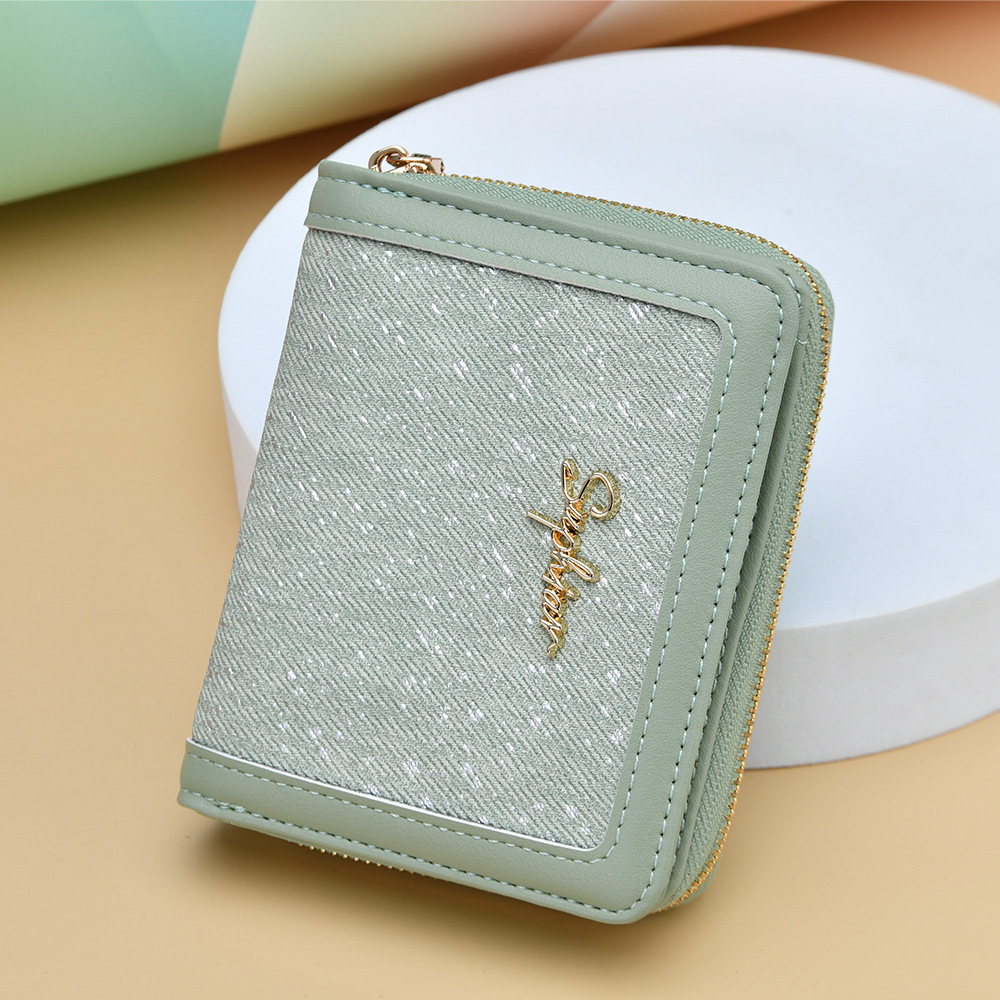 Cartera transfronteriza para mujeres nueva y fresca bolsa de tarjetas con cremallera PU pequeña bolsa de cambio plegable corta de dama alta sensación de cartera