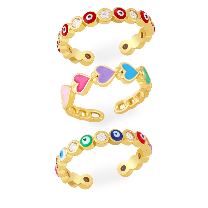 European and American open copper ring micro-inlaid zircon color drip oil creative eye ring