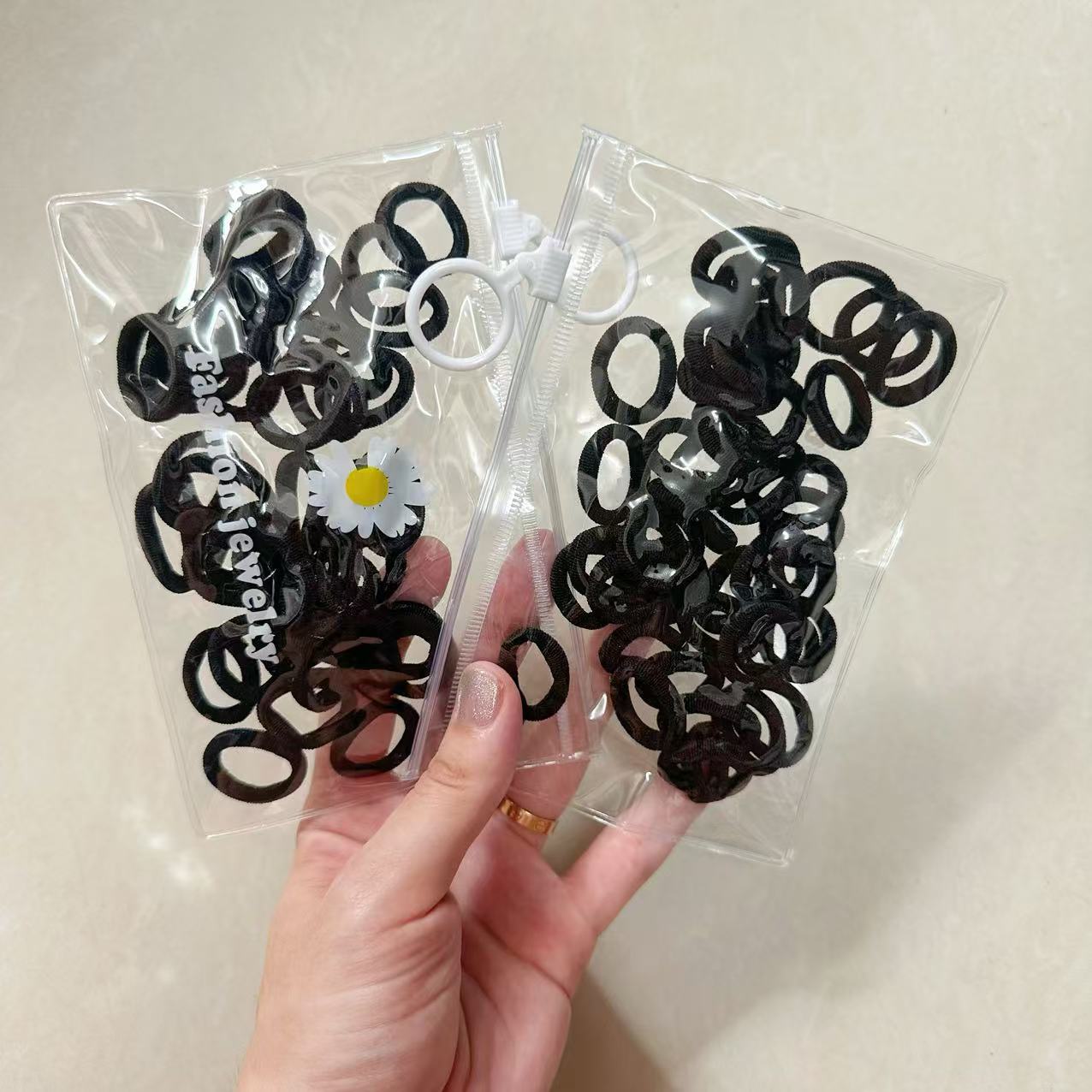 Mini cabeza de princesa en caja, clip de agarre pequeño, clip de flequillo, horquilla rota en la frente, banda elástica para niños, no daña el cabello, anillo del pulgar al por mayor image 101