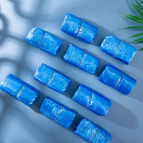 Disposable shoe covers waterproof plastic non-woven non-slip foot covers indoor PE thickened shoe covers wholesale students rainproof