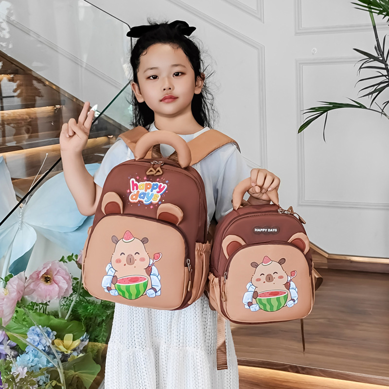 Mochila de estudiantes de primaria de gran capacidad, red, lindas mochilas para niños y niñas, nueva mochila infantil transfronteriza.