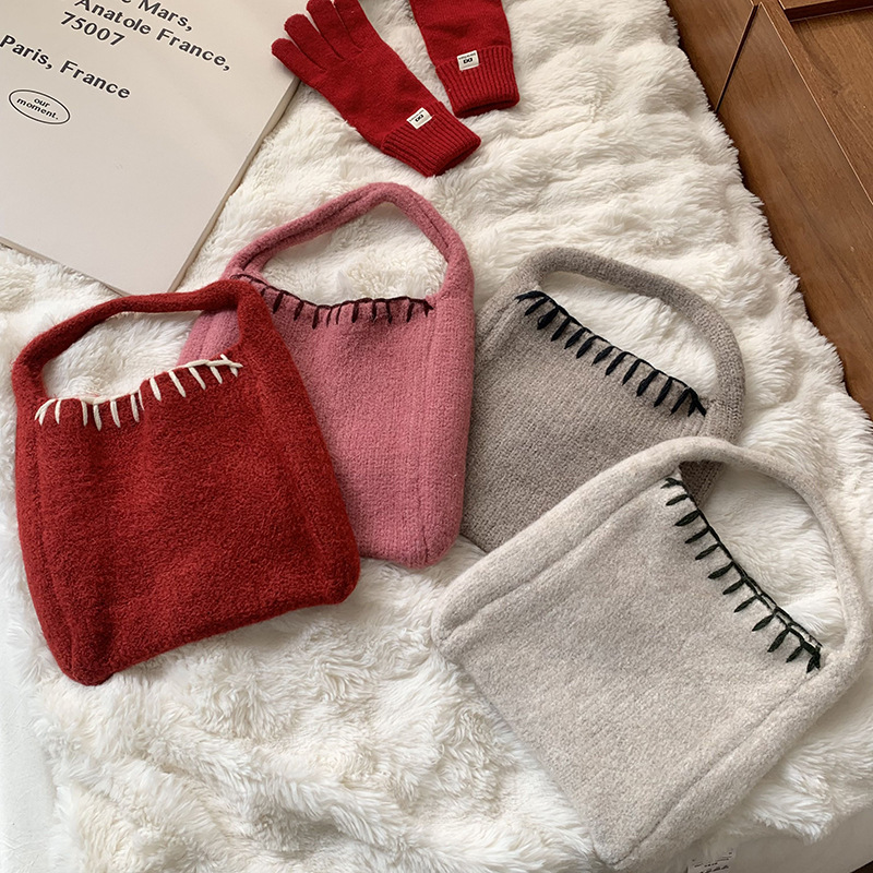 Bolsas de punto otoño y invierno nueva atmósfera bolsas de cesta de verduras bolsas de tejido a mano bolsas de lana de moda bolsas de hombro