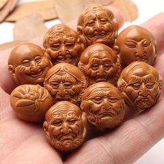 鉄の核の写実的な手作りの18羅漢のシングルリングの手の串の彫刻の文は核の彫刻のオリーブの胡の両面の18羅漢のハンドルを遊びます。