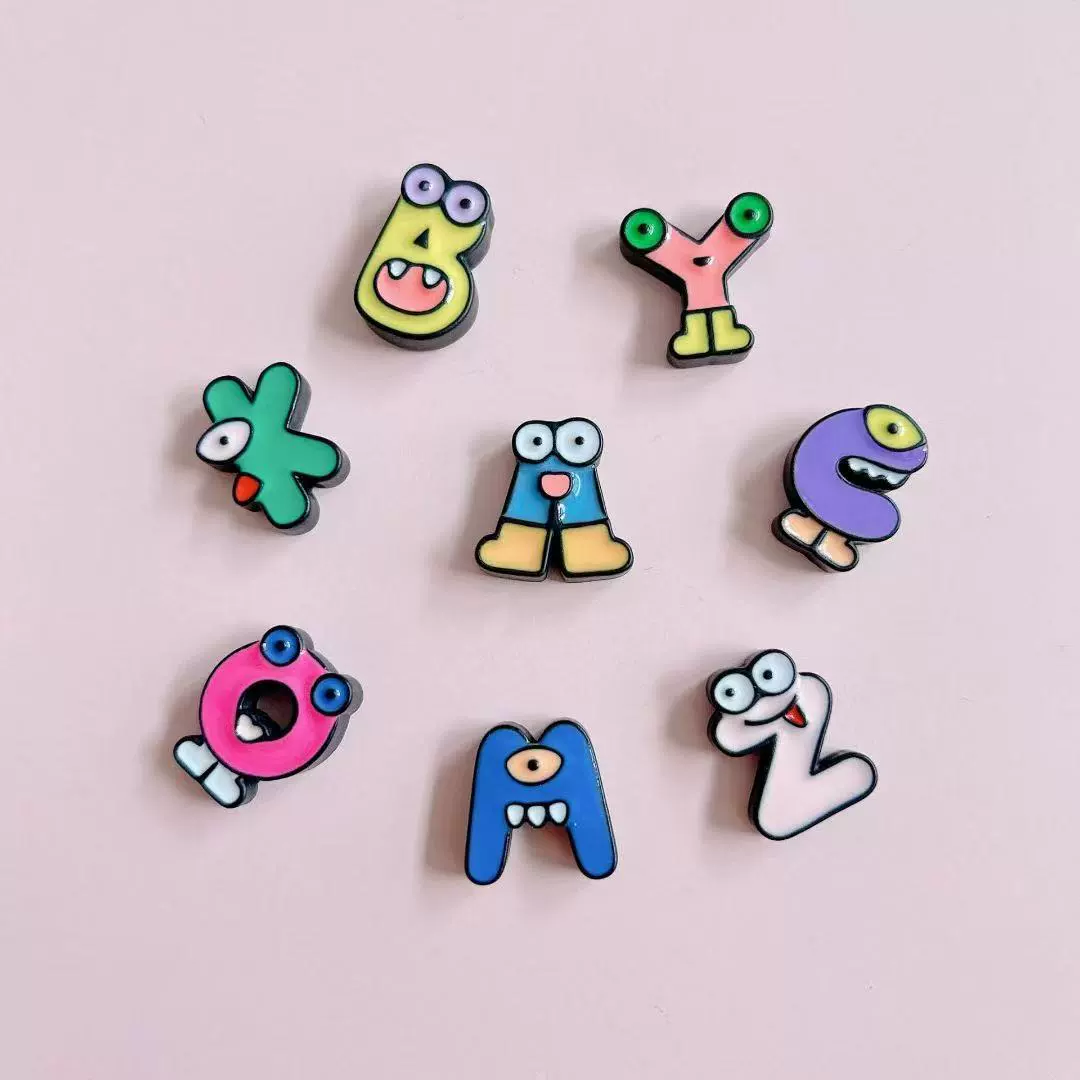 Cartoon plastic colour map with letters, shoelace buckle