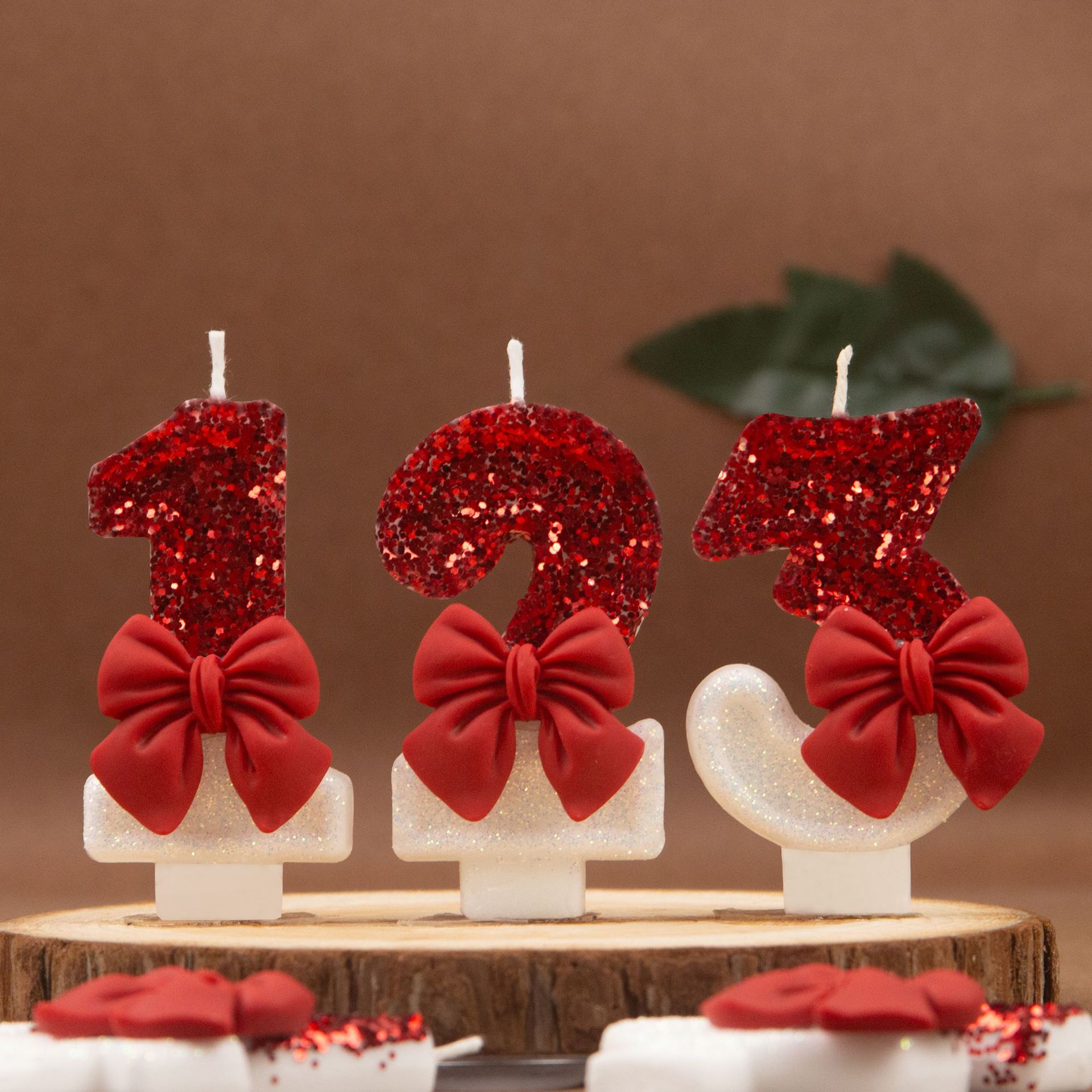 red candle with bow
