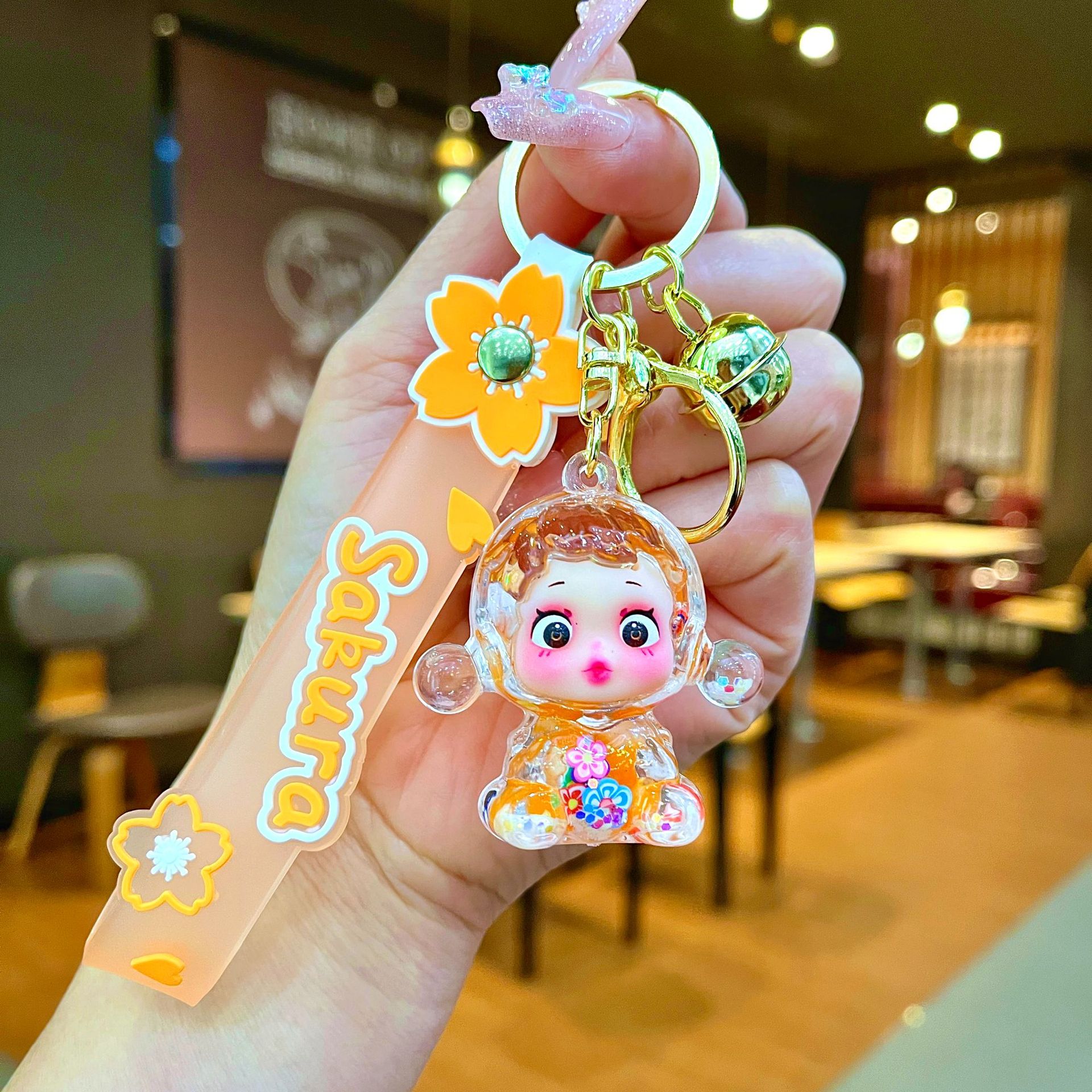 Llavero red acrílico con arena flotante