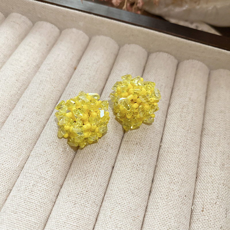 Pendientes de tejido de cristal de flor redonda de aguja de plata Pendientes de todo fósforo de viaje Pendientes de temperamento de moda femenina Sensación de nicho de alto nivel