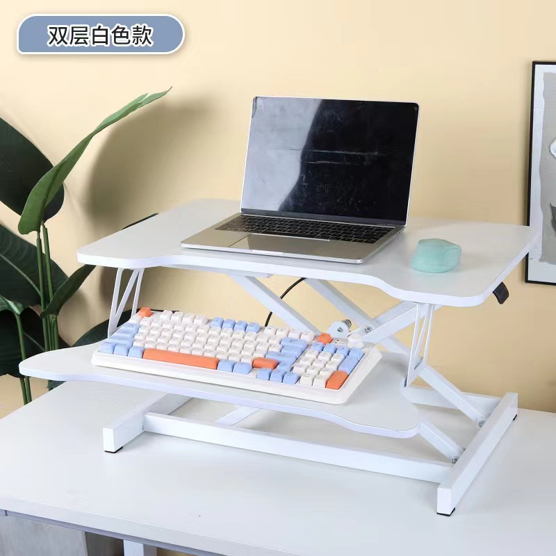 気動机の上のコンピュータの机は立式の事務室の台の上に立って高くなるノートの折り畳みの机で机を昇降することができます。