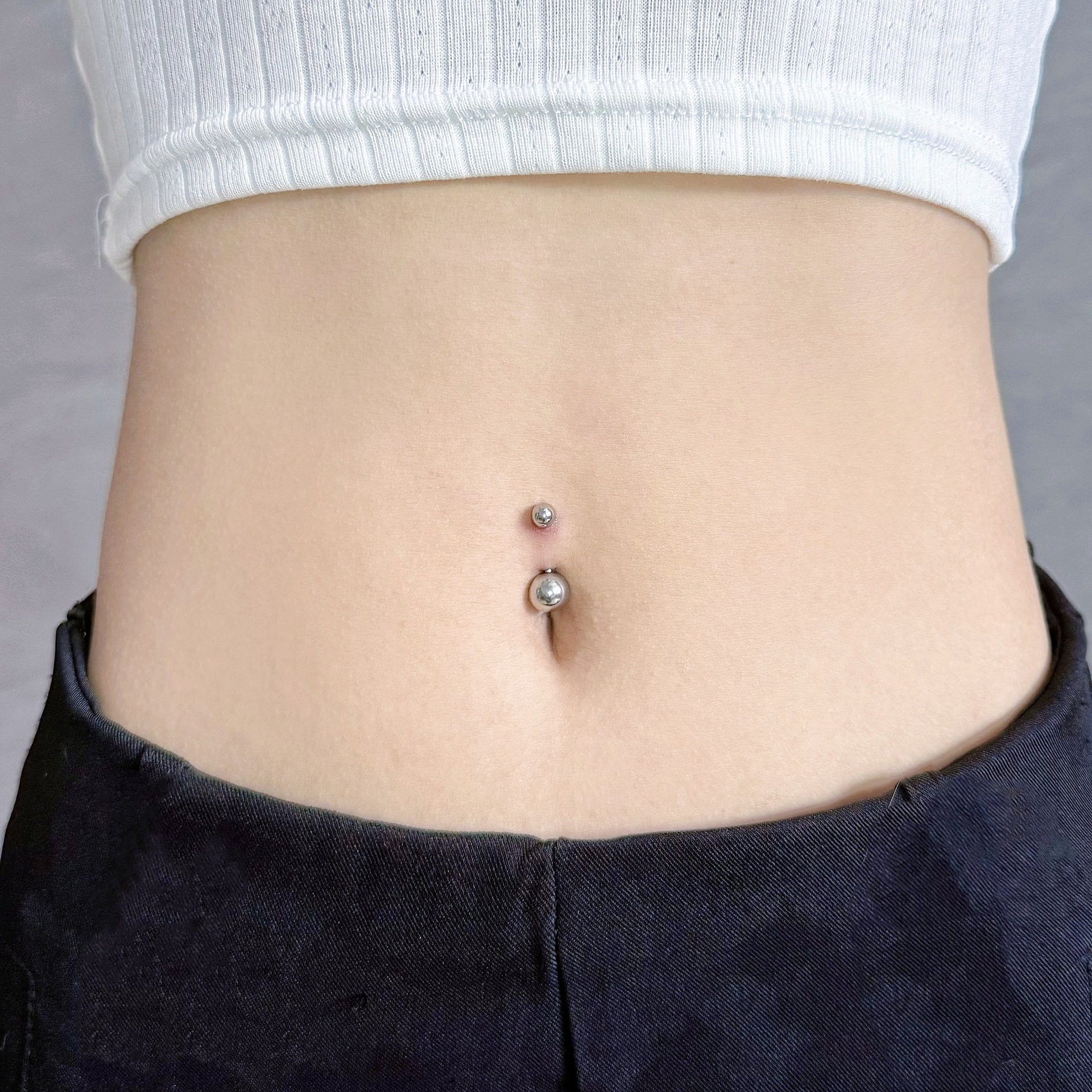 Pointed labret stud close-up product detail