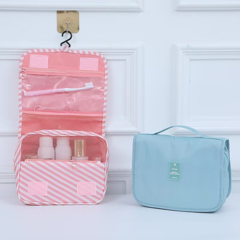 Bolsa de maquillaje de celebridad en línea Twill portátil coreano simple bolsas de lavado de corazón de niña de gran capacidad bolsas de maquillaje de hombre gancho bolsa