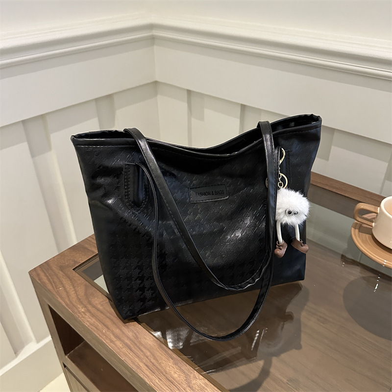 Bolso de mano de viaje al trabajo 2024 primavera nuevo bolso de ocio universal bolso de hombro brazo bolso de mano coreano