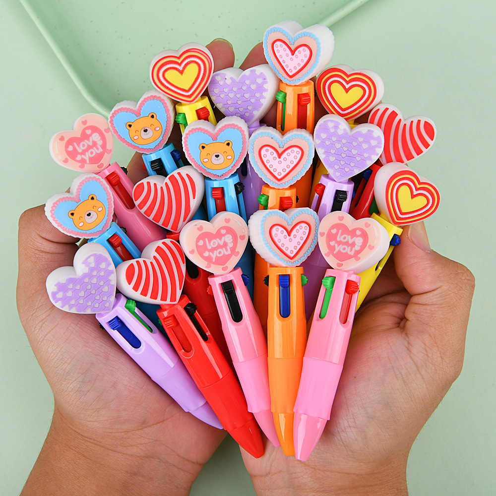Cross-border encantador dibujos animados bolígrafo de cuatro colores creativo regalo de San Valentín bolígrafo multicolor en forma de corazón bolígrafo de amor al por mayor