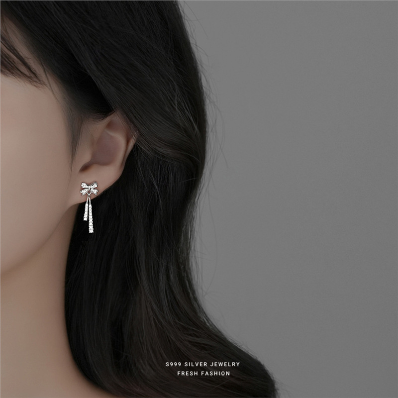 Orecchini a lobo a forma di fiocco in argento puro 999_voghion.com