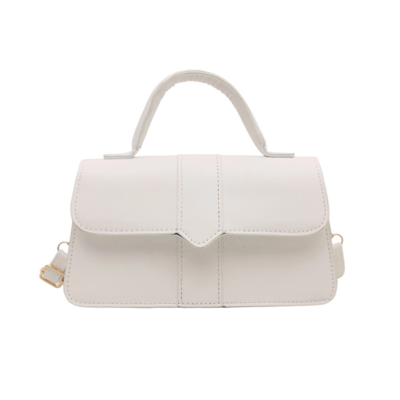 Bolso de color sólido de diseño de nicho para mujer 2025 nuevo bolso cuadrado portátil de moda de moda bolso de mensajero de alta gama de todo fósforo