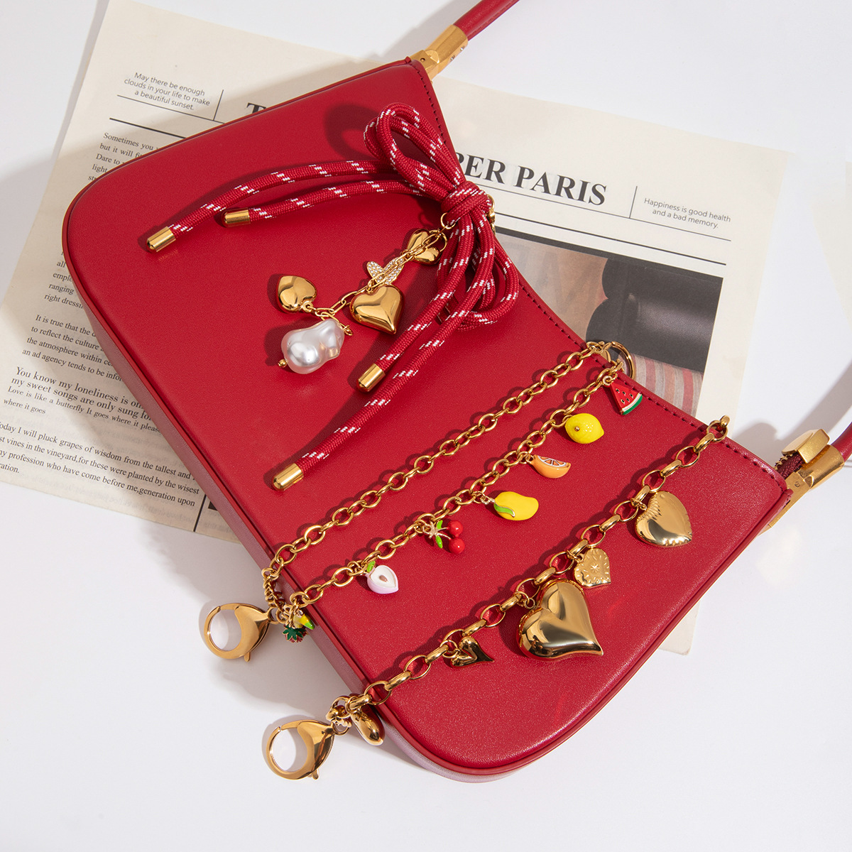 Wanxing Europa y América de alta gama bolso colgante diseño de nicho sentido titanio acero 18 quilates amor dorado fruta cadena colgante joyería de perlas