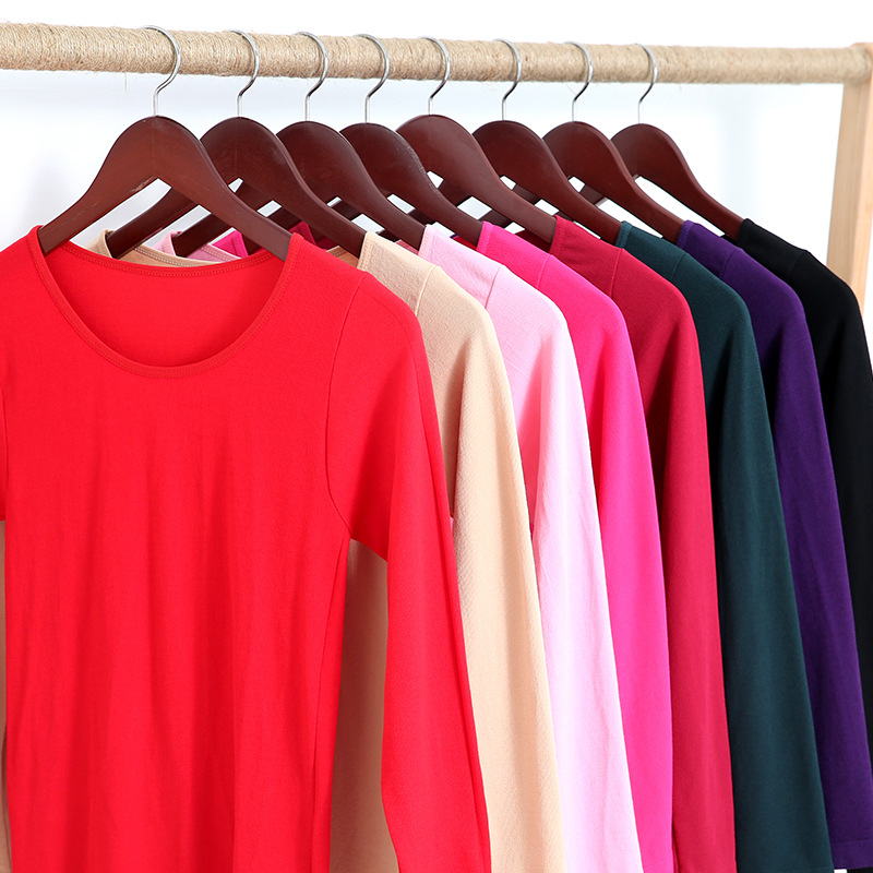Ropa interior térmica de alta elasticidad con retención de calor de tres segundos para mujer, conjunto de top y pantalón de cuello redondo de color sólido, delgado y cálido para invierno, a la moda.