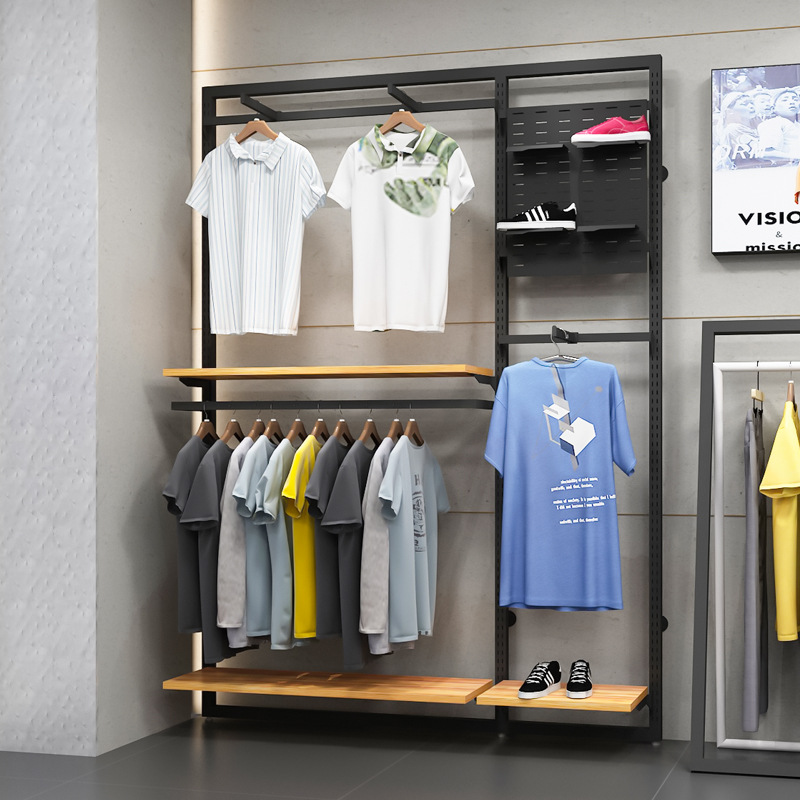 Tienda de ropa deportiva soporte de exhibición piso estante para hombres centro comercial estante de ropa casual de gama alta pared tienda de ropa para hombres