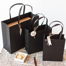 礼品袋简约黑色纸袋子手提铆钉礼品盒包装袋生日伴手礼代发
