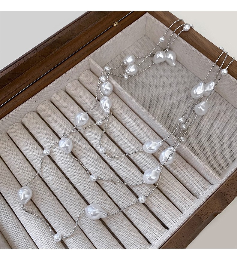 Collar con cuentas de perlas de gota de agua con diamantes transfronterizos otoño e invierno cadena de suéter de lujo ligero francés moda todo fósforo joyería de alta gama