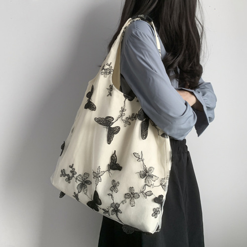 Super beautiful embroidered black butterfly canvas bag lace fairy casual travel women's bag literary large capacity versatile shoulder bag