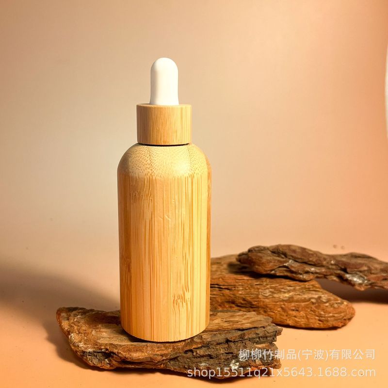 竹のゴムの頭の点滴の瓶の精華の液体の携帯は瓶の竹の製の光を避ける精華を分けて瓶の竹の木を分けて瓶を詰めます|undefined