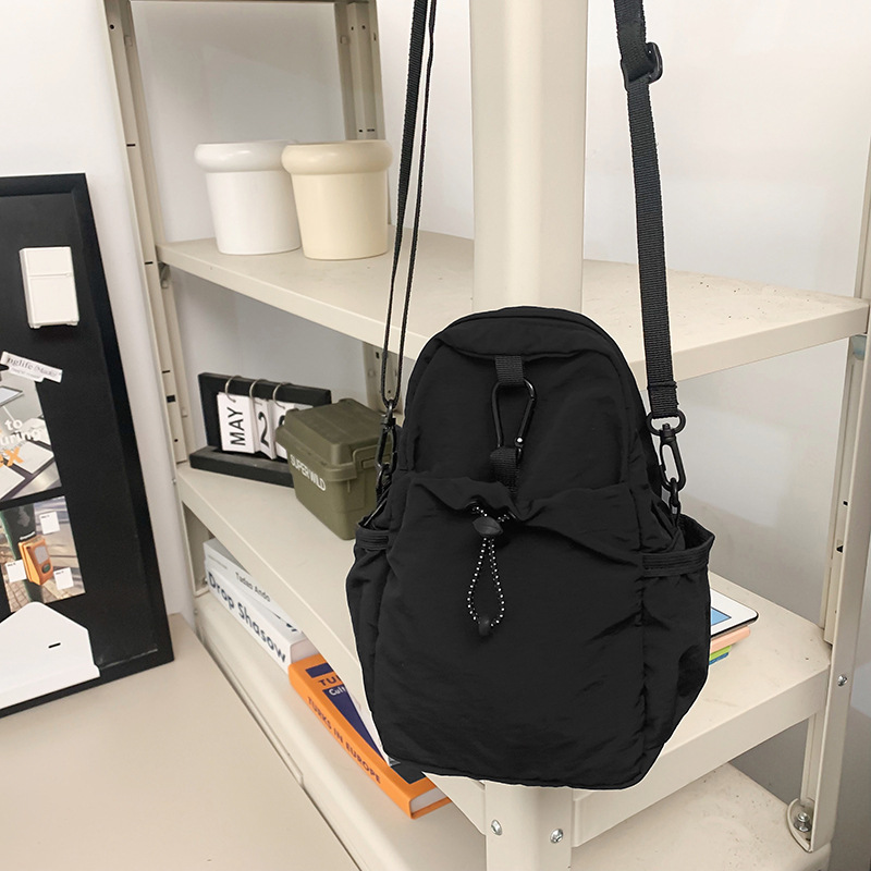 Solid-color nylon fabric bag for women, Spring 2025 new niche waist bag, ins casual pleated phone bag, crossbody bag for women undefined