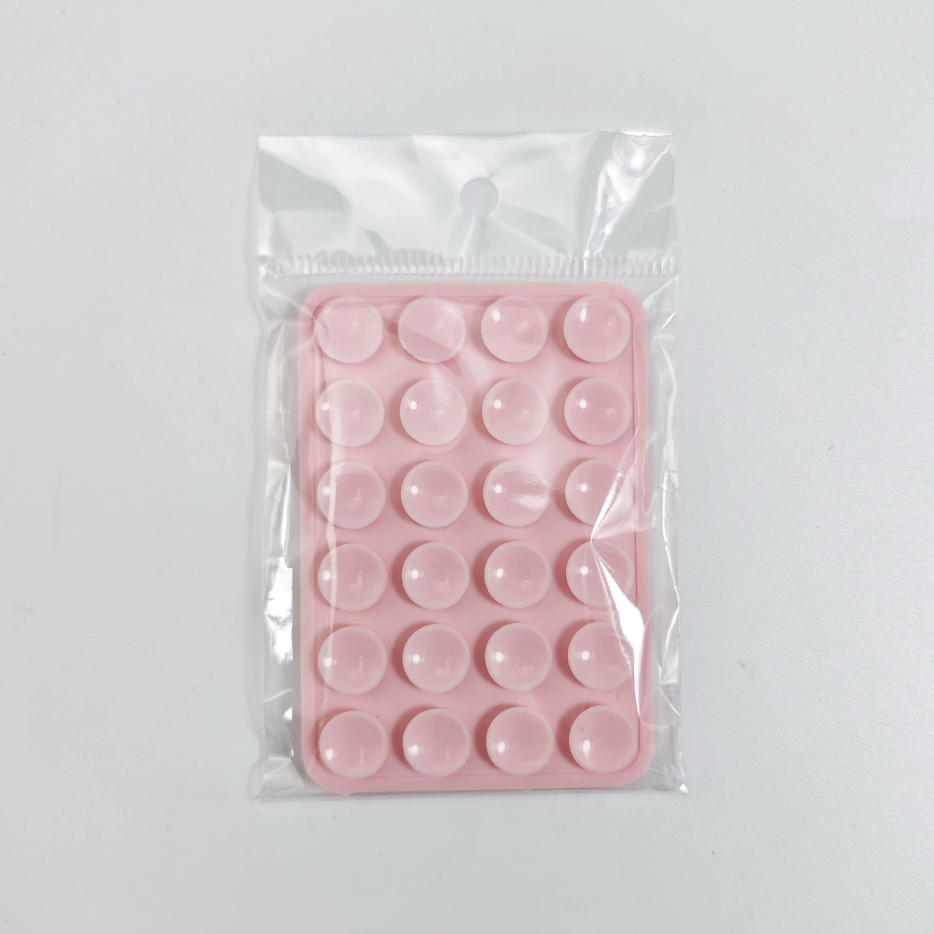 Double-sided silicone suction pads, food-grade, 24- and 40-capsule sizes, ~10 g each