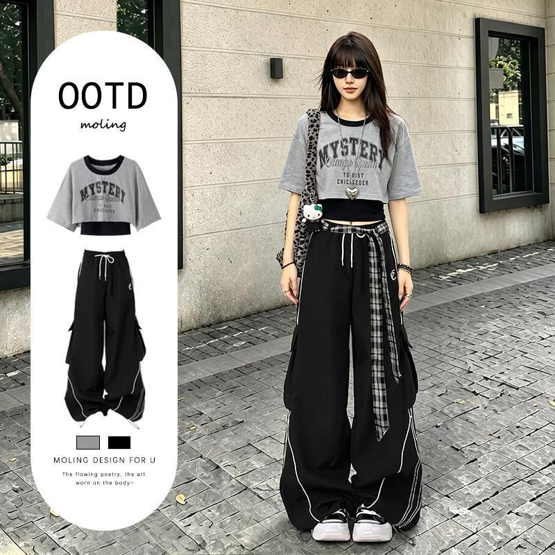 Cool and stylish jazz dance summer outfits for 2026: a hot black cargo pants set for women.